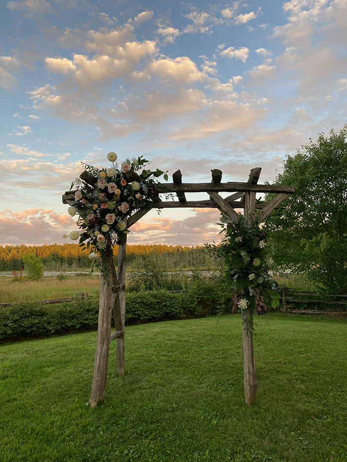 Rustic wedding arbour overlooking the landscape at Brooklands Farm