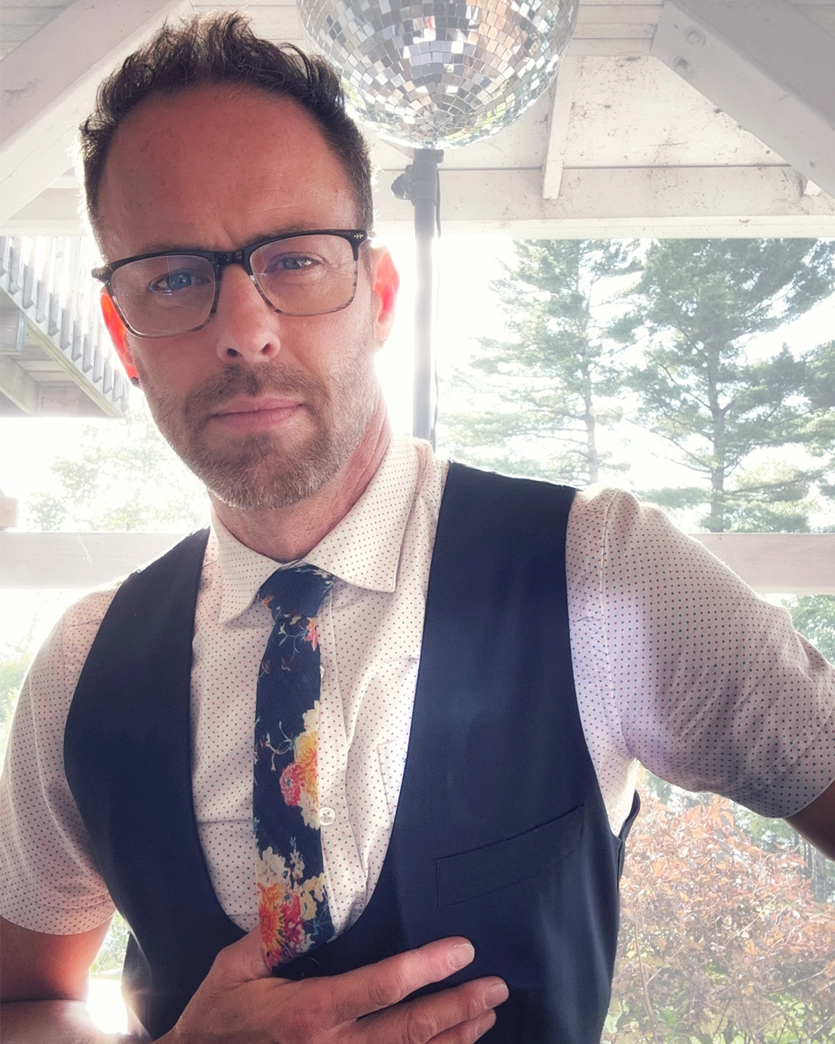 Jamieson Bruce preparing to DJ a wedding in Muskoka