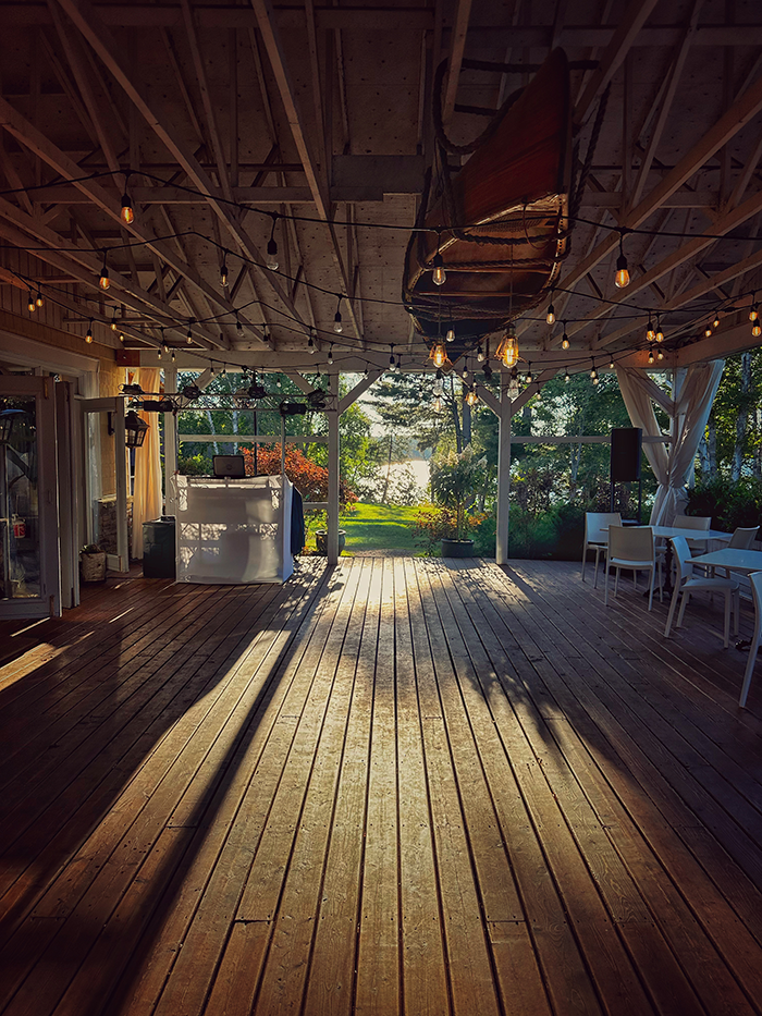 Reception space beneath the suspended canoe at The Northridge Inn and Resort